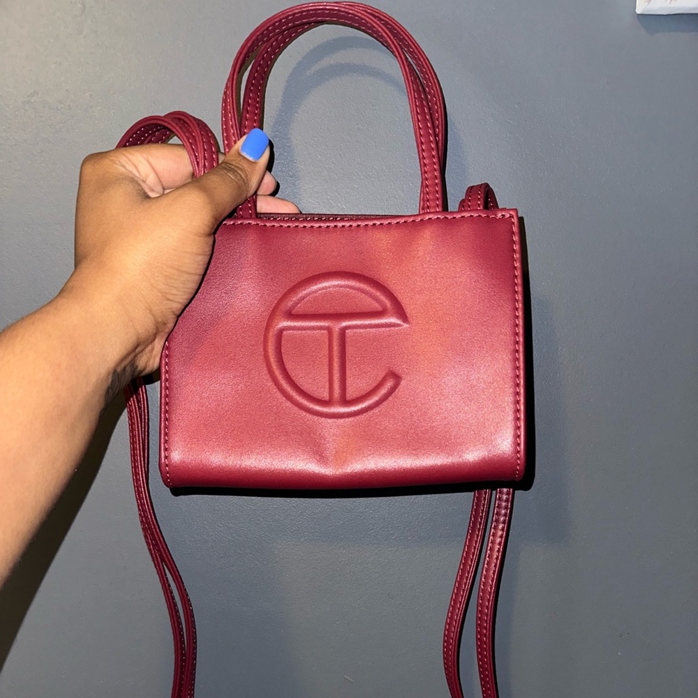 Telfar Red Crossbody Bag with Embossed Logo and Minimalist Design